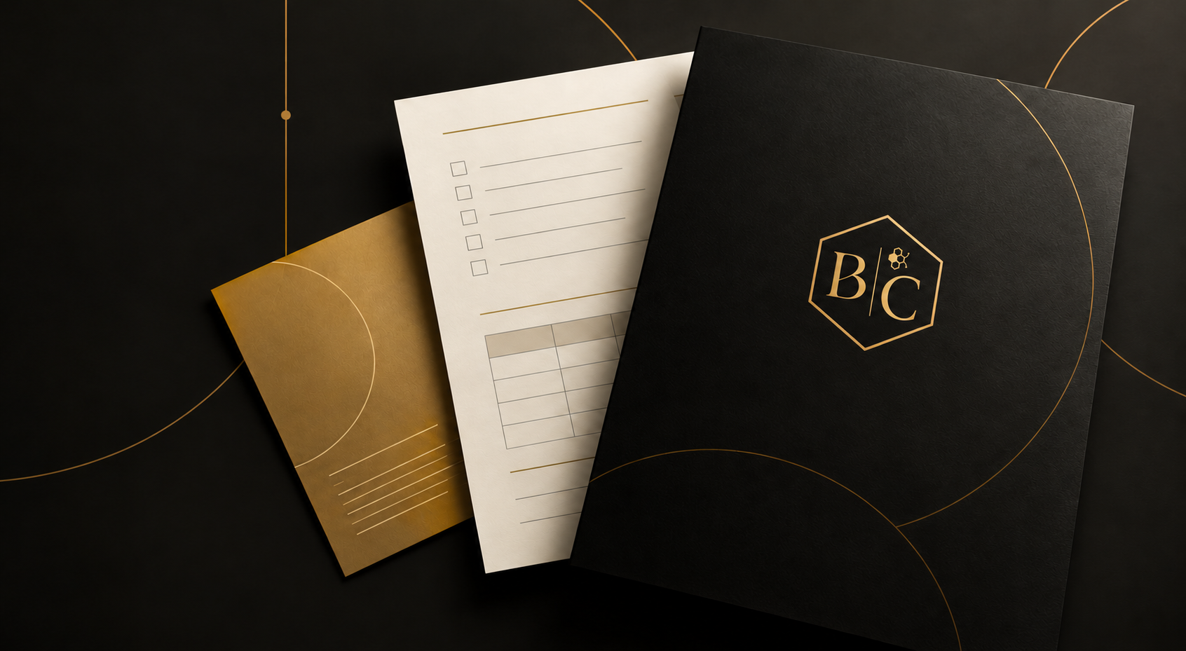 Bee & Co branded accounting stationery in black, gold and cream